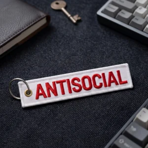 Breloc Brodat - Prestige Flame - Antisocial Material premium impermeabil, extrem de durabil în timp. Ață de înaltă calitate, rezistentă la intemperii, raze UV, căldură și frecare